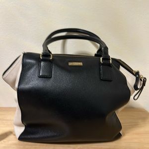 Black, off-white Kate Spade Magnolia Park Ollie Bag. Heavily used.